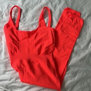 Free People Movement Women's Good Karma Onesie in Hot Watermelon/Coral Size M/L